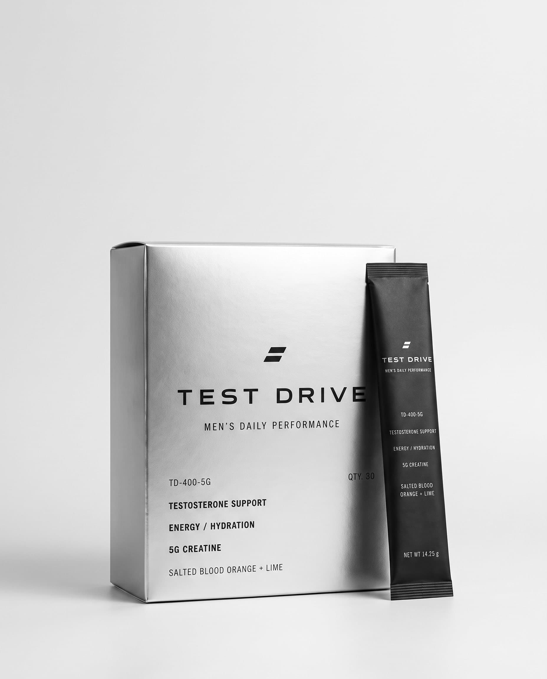 Test Drive silver product box and black daily performance stick pack